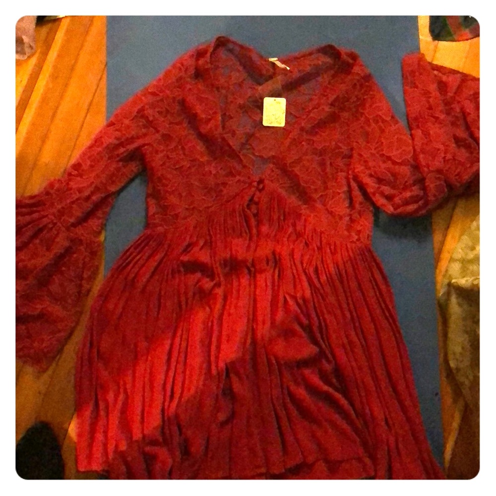 Red long bell sleeved Dress